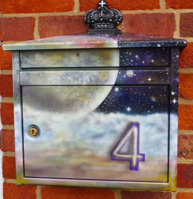 Space design on a steel post box airbrushed and lacqured